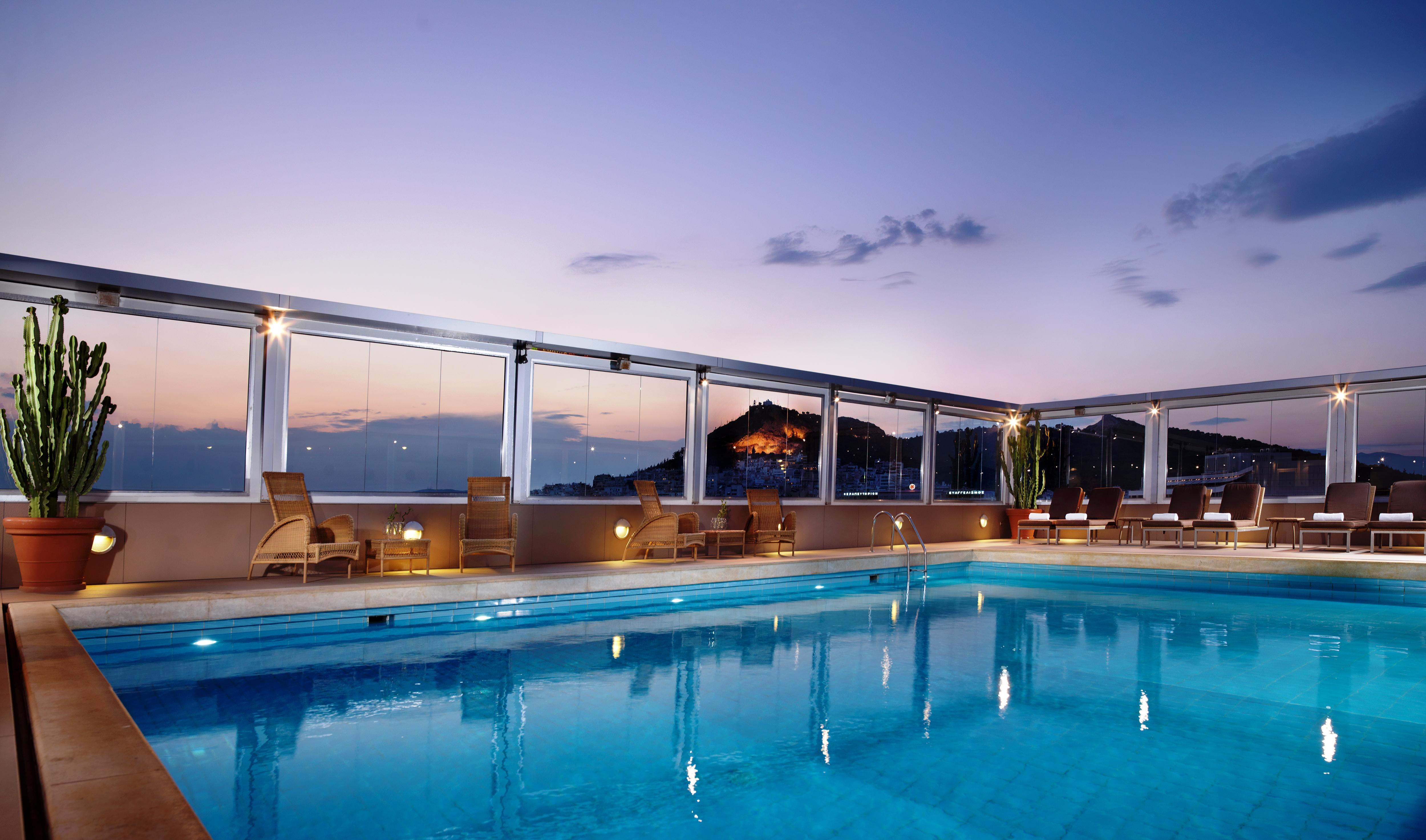 Divani Caravel Афіни Екстер'єр фото The pool at the hotel